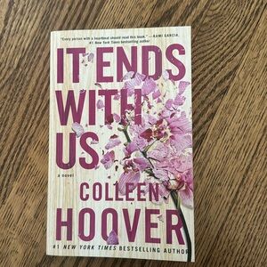 It Ends With Us by Colleen Hoover. Soft cover book.